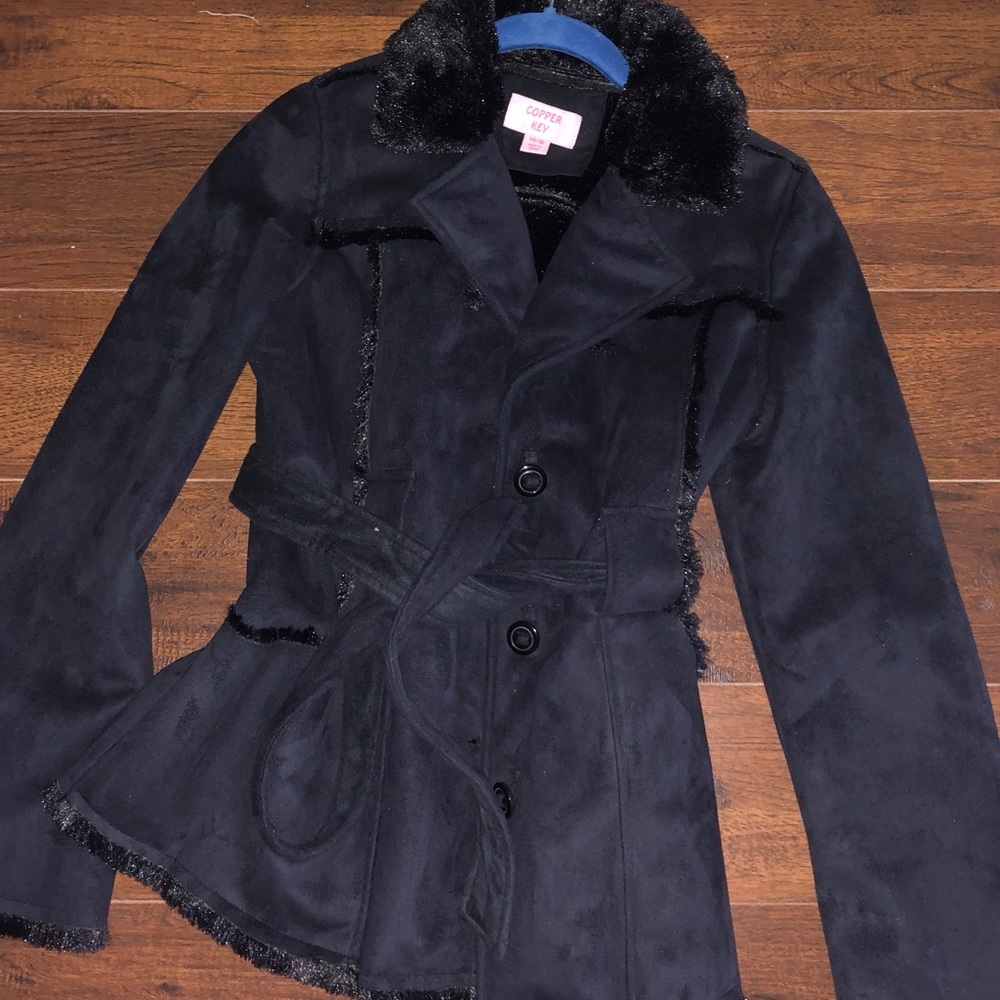 Suede like jacket with faux fur lining.